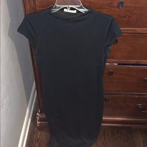 Form fitted black knee length dress